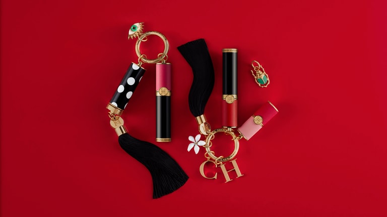 Carolina herrera lipstick bag shop